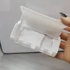 Wall-mounted toothpaste holder, a no-hole facial cleanser holder, bathroom toothpaste holder, and wall storage rack in the bathroom Item Picture